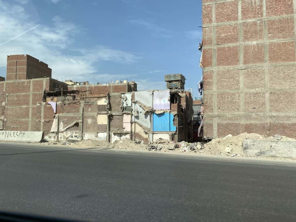 Unfinished buildings alongside the Cairo freeway