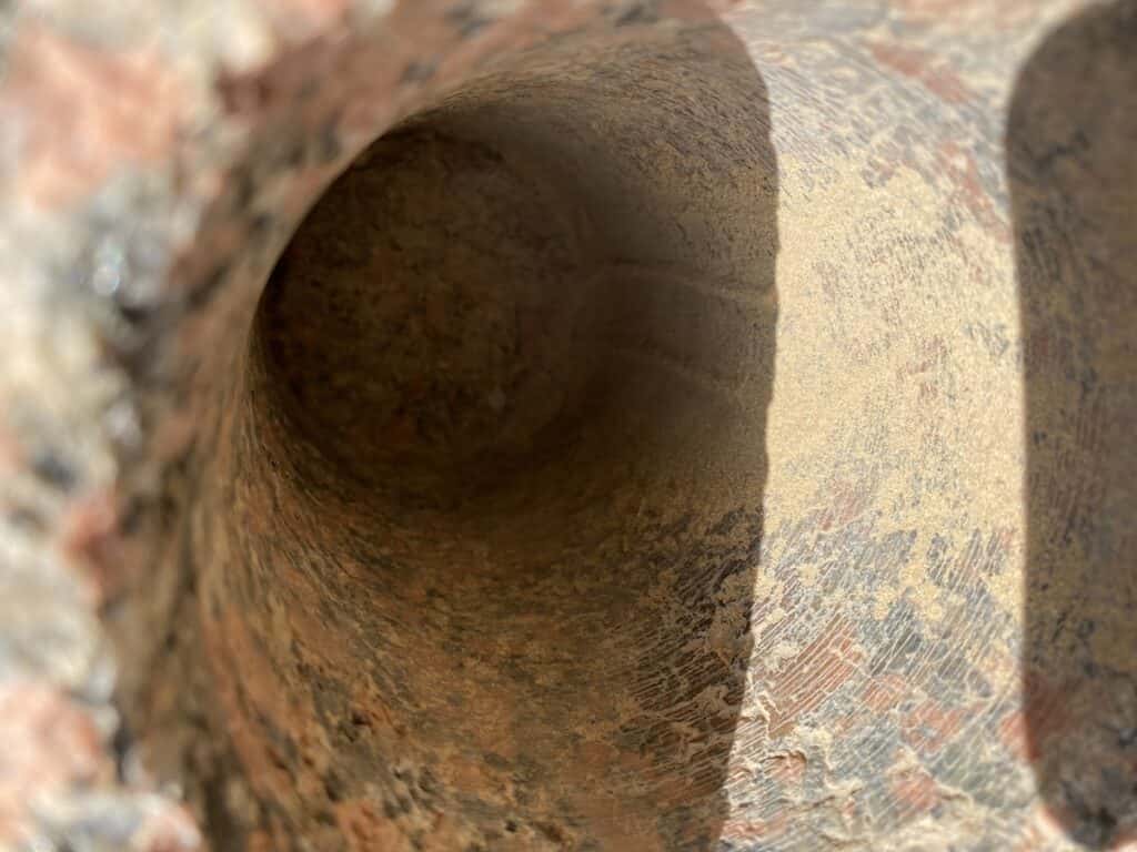 Tube drill hole in pink granite at Abu Ghorab