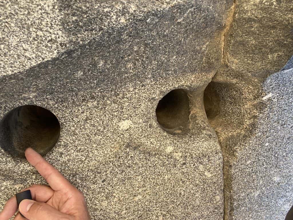 Stone with multiple tube drill holes