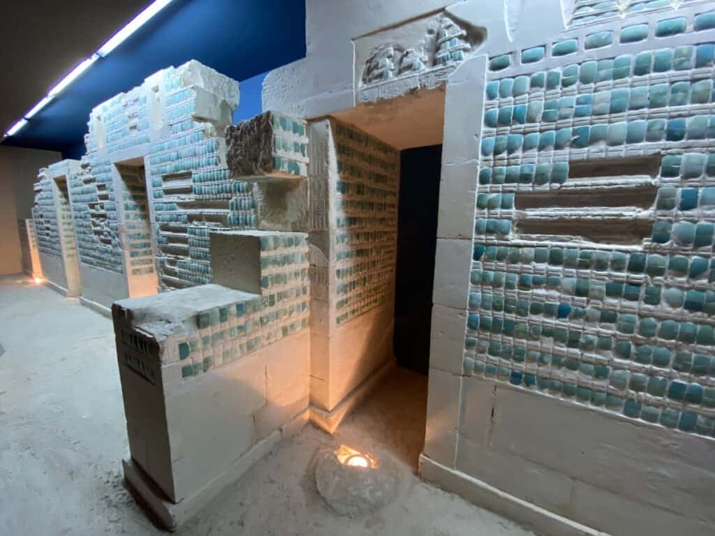 Reconstructed tile faced wall