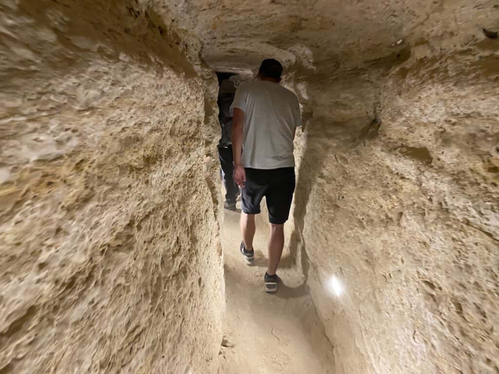 Walking in a passageway under the Step Pyramid