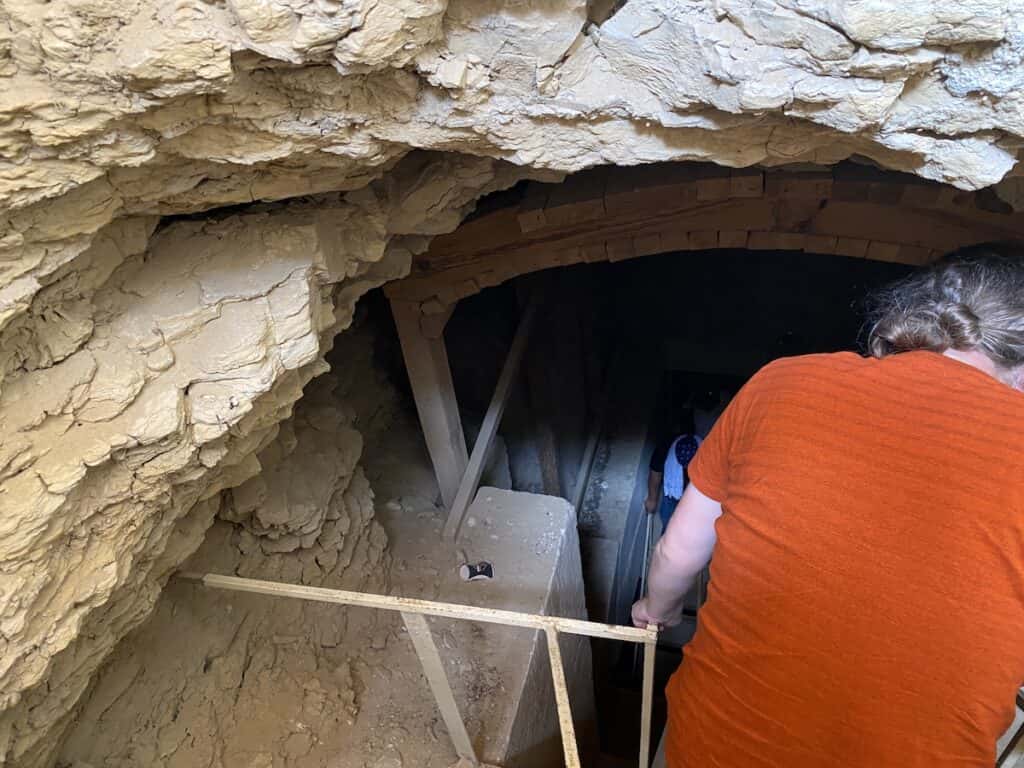 Walk down the stairs and twisty passages to enter the Lahun Pyramid