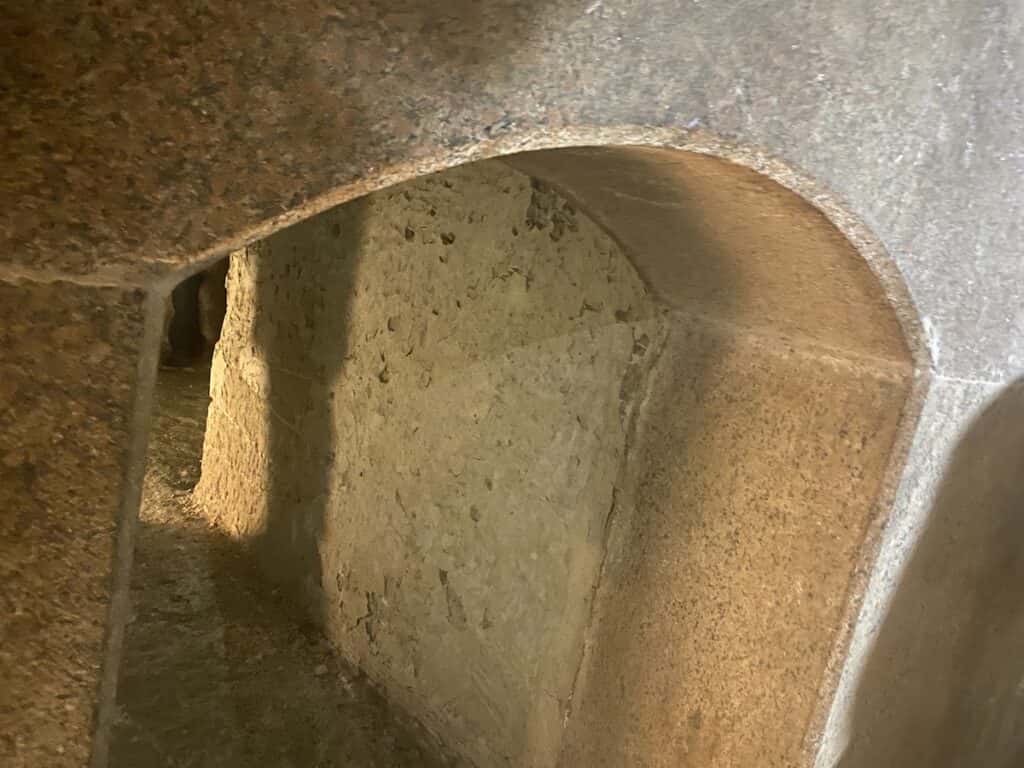 Beautifully smooth arched doorway leads to another chamber