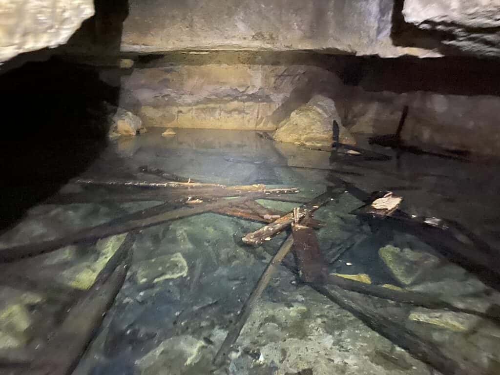 Stone box under the water in the Osiris Shaft