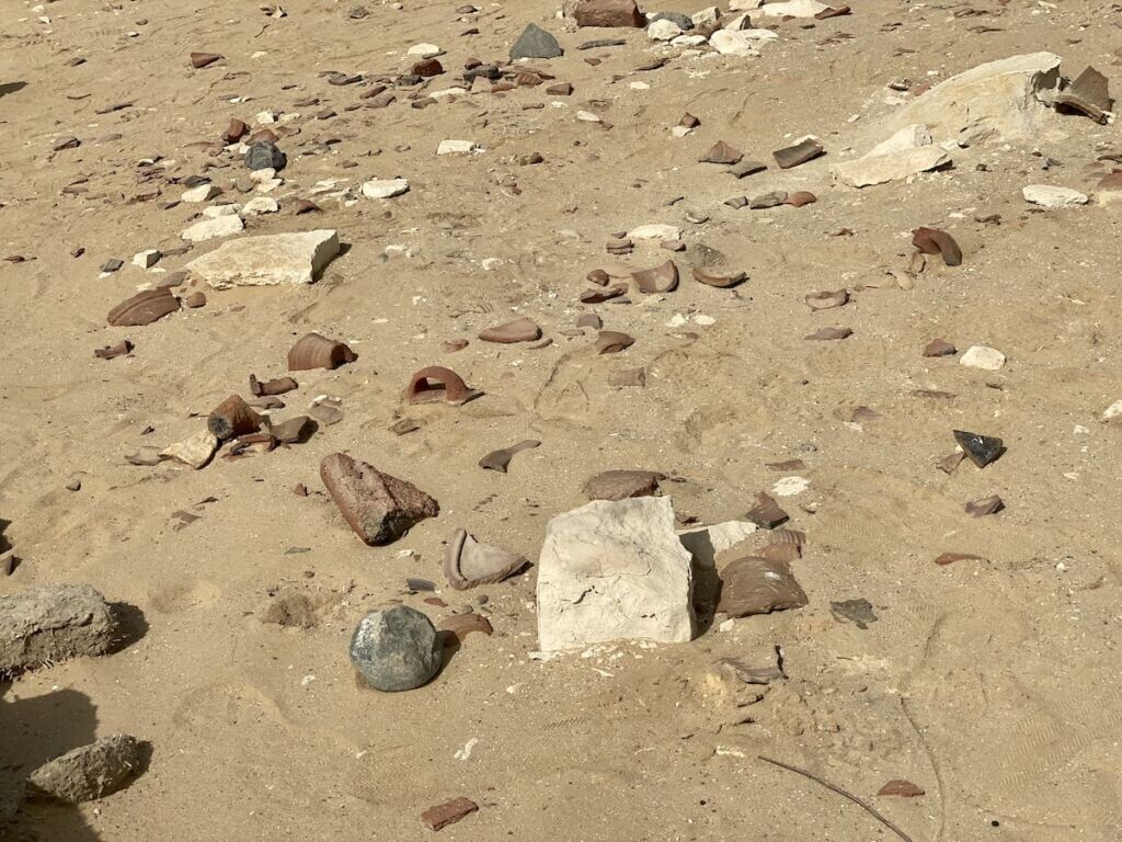 Outside the Lahun Pyramid is a collection of pottery shards.