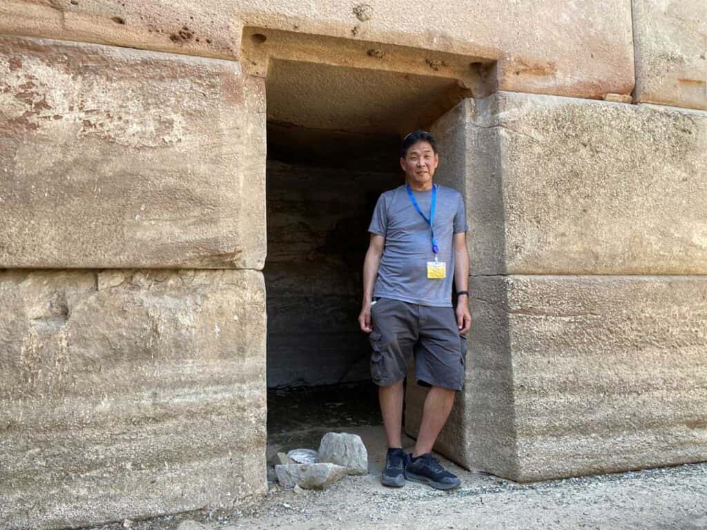 Man standing in the doorway of an Osirion side room