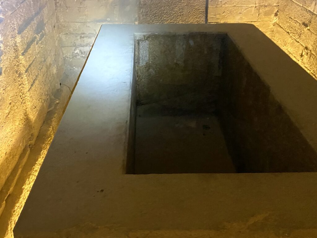 granite box interior Serapeum Saqqara underground chamber