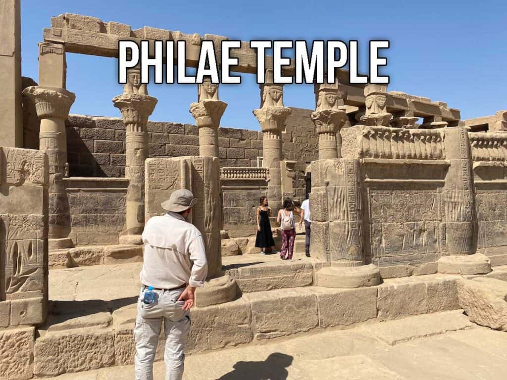 Man gazing into the Philae Temple in Egypt