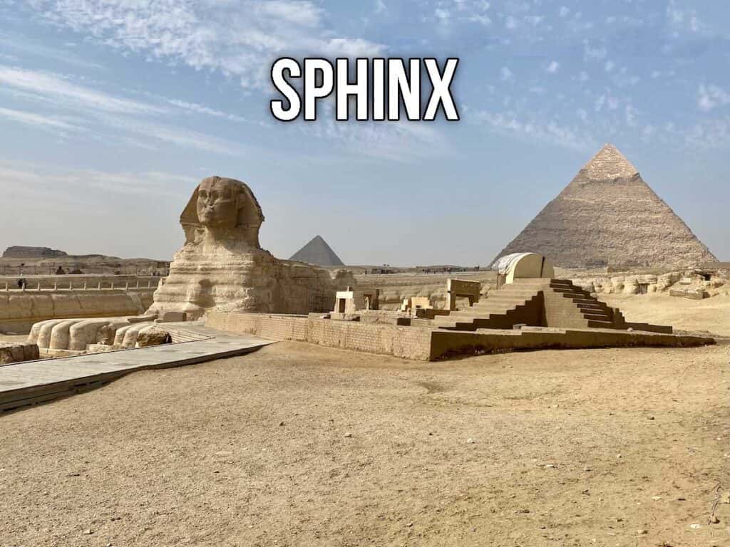 Sphinx on one side, middle pyramid on the other.