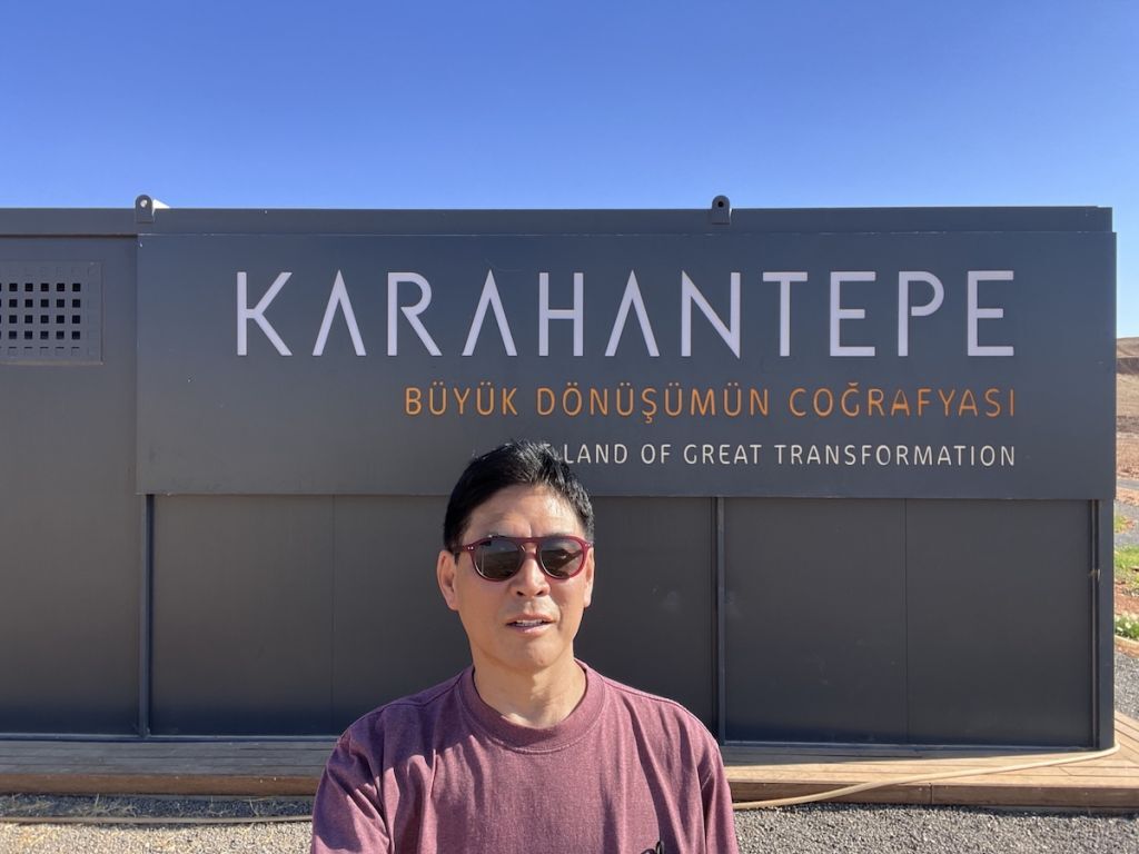 Man at karahan tepe visitor center