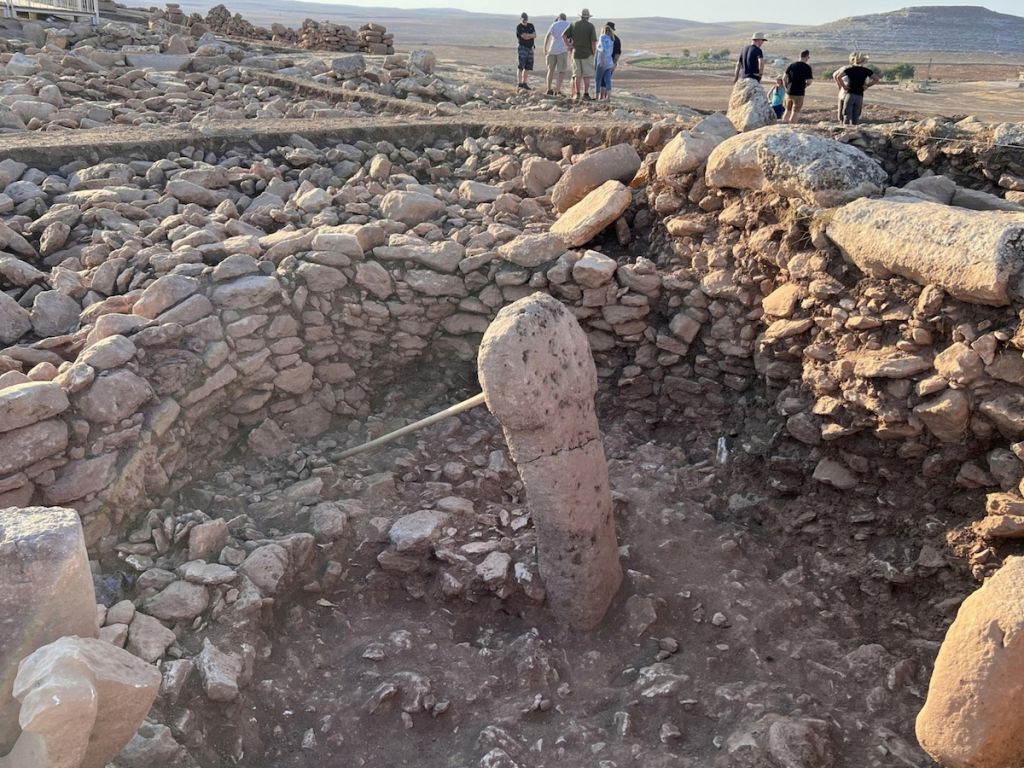Short pillar at Karahan Tepe, propped up with a long wooden pole