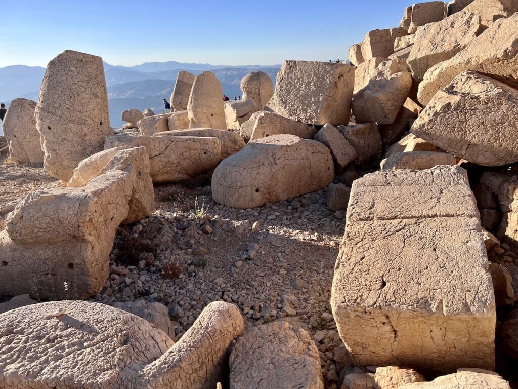 Non-descript statue fragments in the back