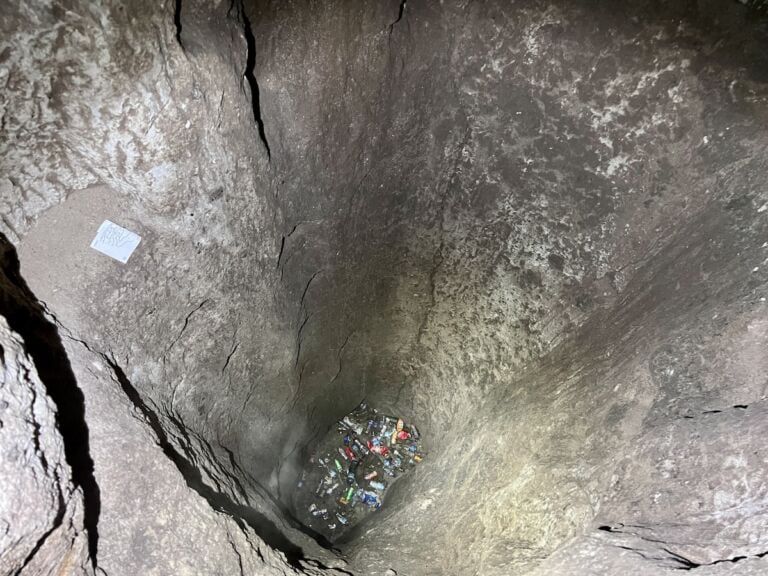 Derinkuyu deep pit with trash