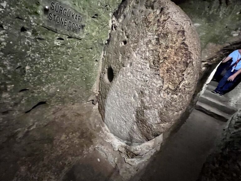 Derinkuyu stone door sign, and hole in the door.