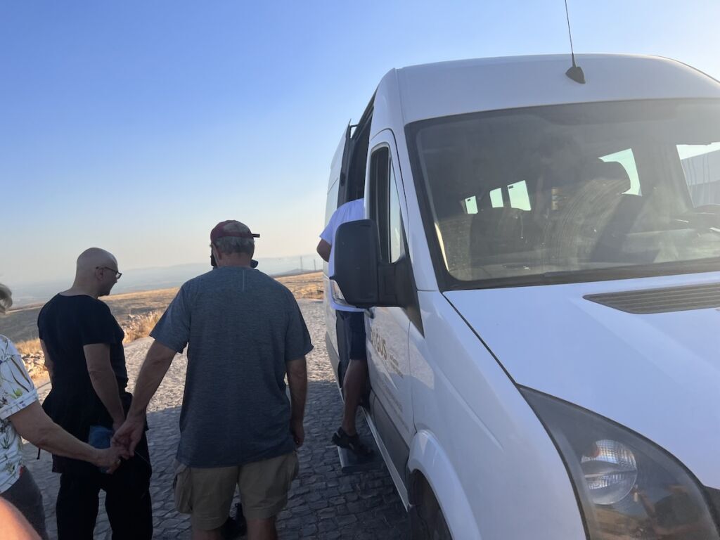 Shuttle van between visitor center and tent