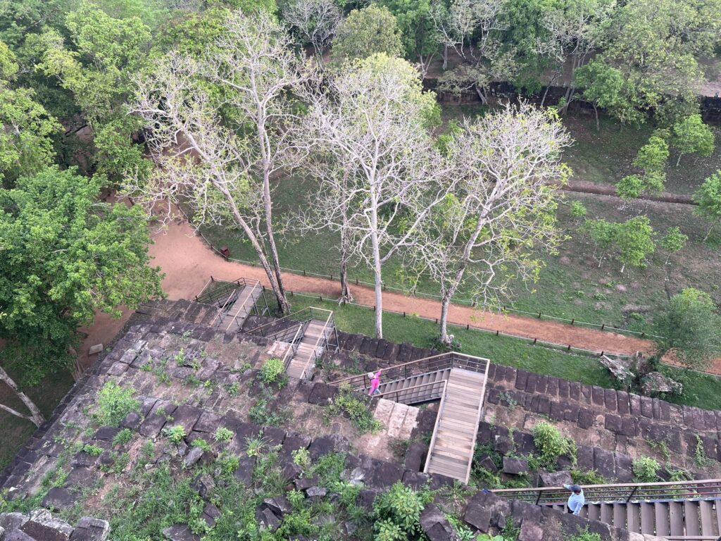 Looking down the wooden staircase and landings on the east face of the Koh Ker pyramid