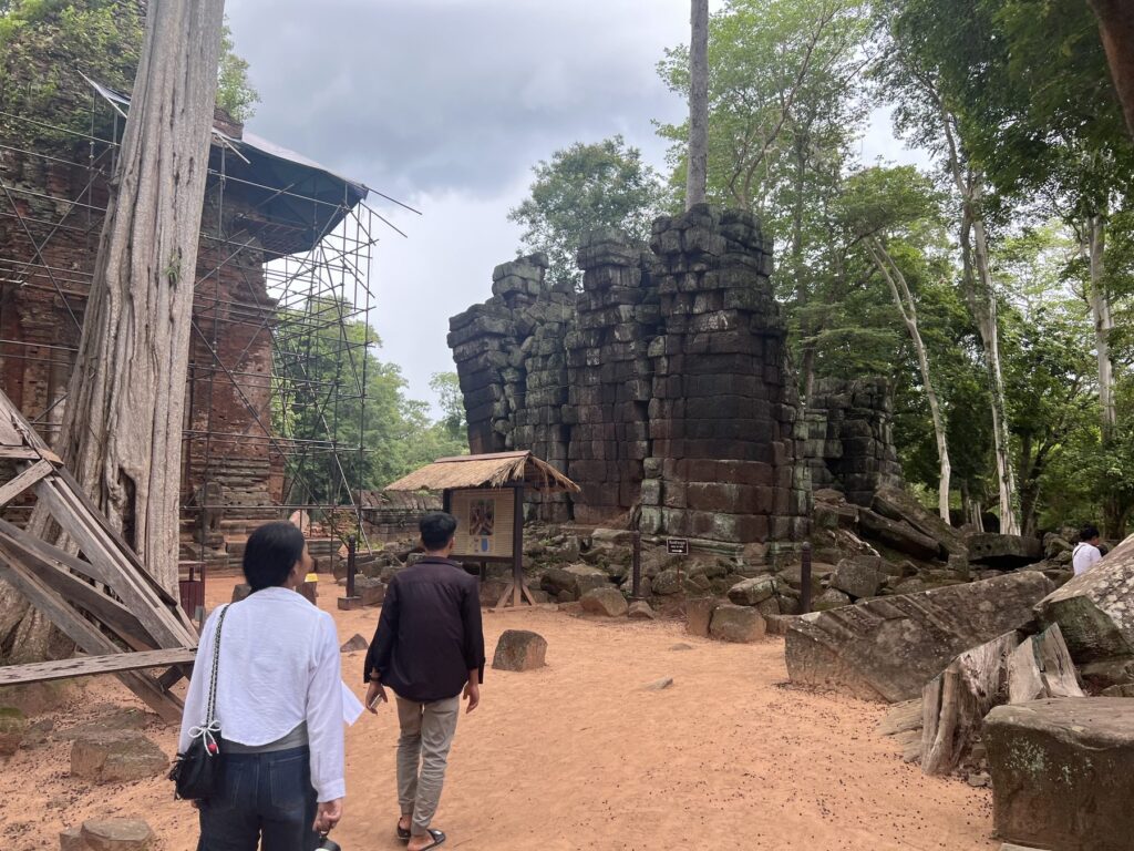 Scaffolding and ruined towers at Prasat Thom, the temple complex in front of the Koh Ker pyramid