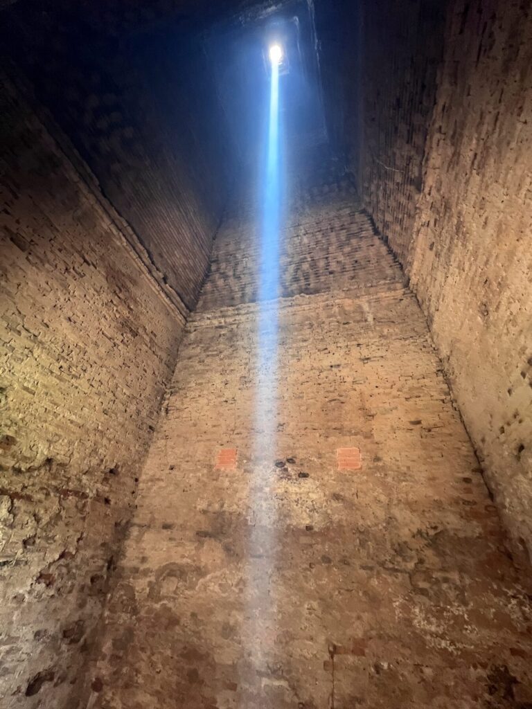 The zenith sunbeam a little off center in the chamber at Lolei