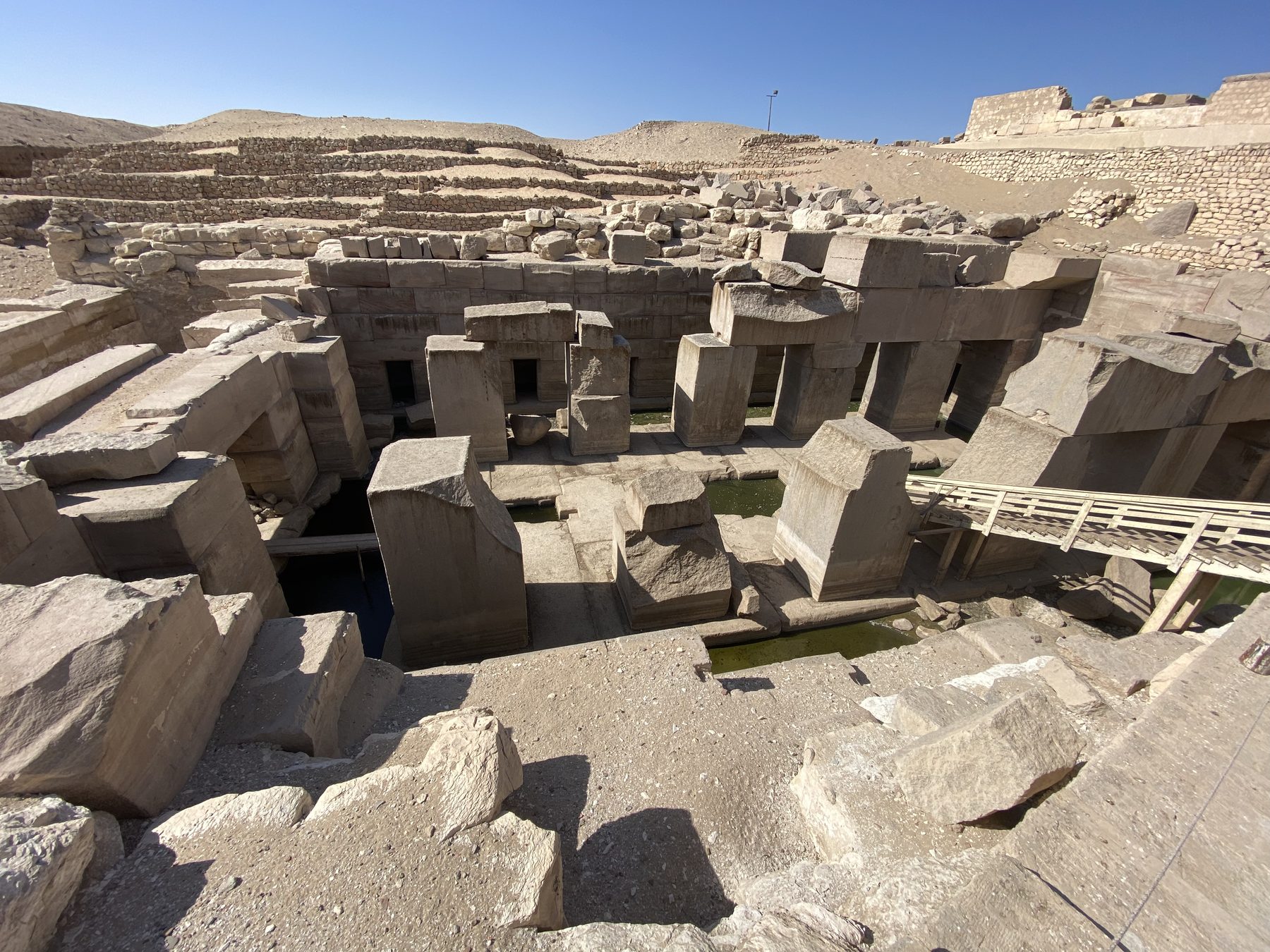 The central hall of the Osirion seen from above, with its rows of massive stone pillars and walkways