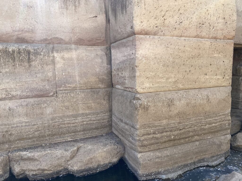 Corner of the Osirion built from huge stacked megalithic blocks with no carvings